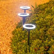 Solar Lawn Lights Inserted in The Courtyard